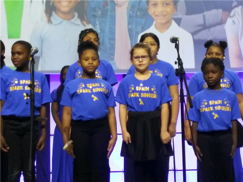 Students singing the National Anthem